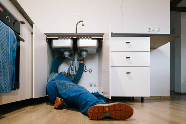 Professional Drain Cleaning technician working in Guilford, IN